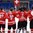 SOCHI, RUSSIA - APRIL 23: Swiss players stand at the blue line listening to the national anthem as Swiss flag is hoisted during preliminary round action at the 2013 IIHF Ice Hockey U18 World Championship. (Photo by Matthew Murnaghan/HHOF-IIHF Images)